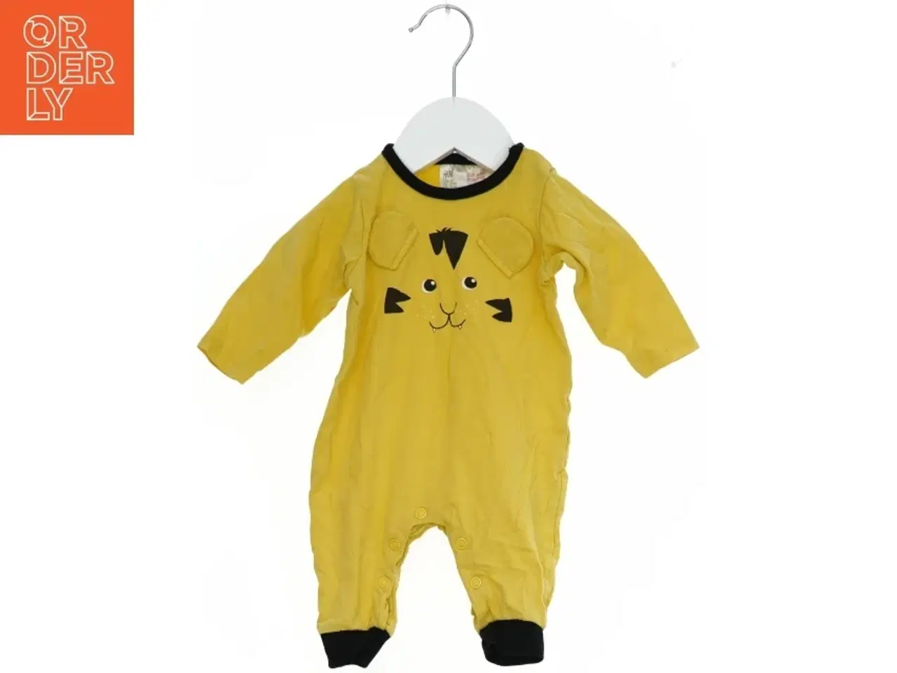 Billede 1 - Gul heldragt med dyremotiv fra H&M (str. 50)