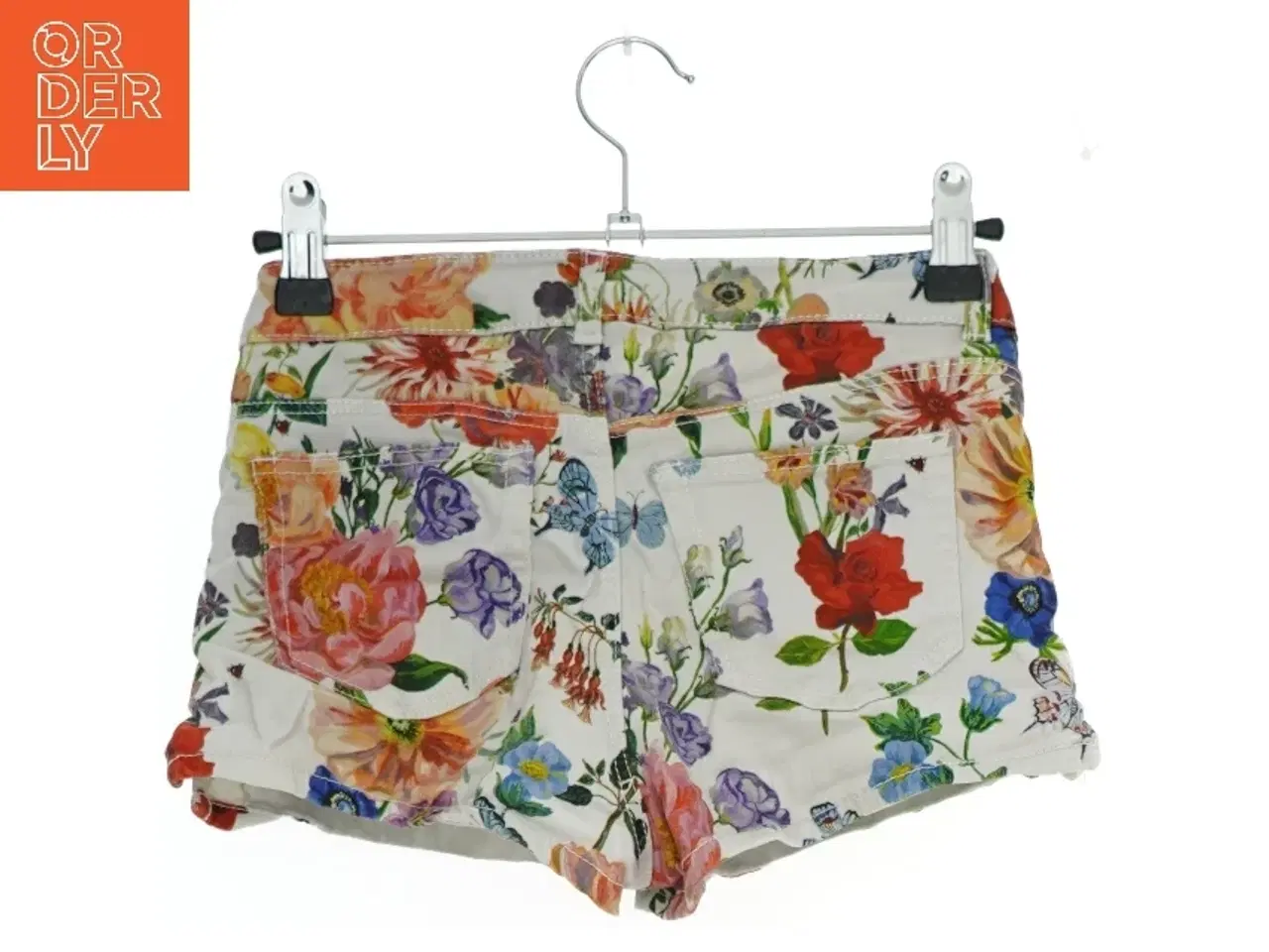 Billede 2 - Blomstrede shorts fra H&M (str. 146)