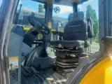 New Holland LB115 - 4