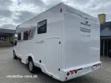 2023 - Rollerteam Kronos 265TL Comfort Power Selekt   Elektrisk justerbar fritstående dobbeltseng i bag og el-seng under loftet over siddegruppen - 5 S. selepladser - 2