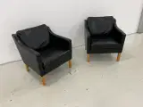 Nielaus lounge stole i sort semi anilin læder. - 2