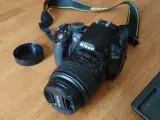 Nikon D3100, 14.2 mp, 32 Gb ram, AF-S 18-55mm obje