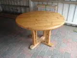 Rundt bord med tillægsplade