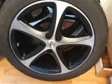 Ubrugte 18"x 8"aufælge med ubrugte dæk under halv 