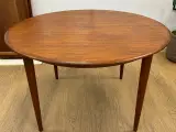 Smukt rundt Spisebord med 3 tillægsplader, Design  - 2