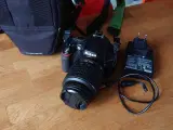 Nikon D3100 16mp, 64gb ram, 18-55mm objektiv
