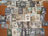 62 antikke postkort af børn og unge fra ca. 1910.