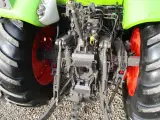 CLAAS Arion 440 med frontlæser - 2