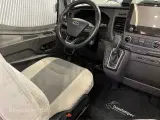 2021 - Chausson Titanium 720 Premium   Køjer samt stor dobbelt sænkeseng, 5-prs. 4 sovepladser m.mulighed for 5-6. Smart-lounge, indbygget gasfyldeflaske, markise, cykelholder, 170Hk - Aut. - 2
