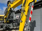 Wacker Neuson EW 100  Gummihjuler med rotortilt, vogn og fuld skovlpakke - 4