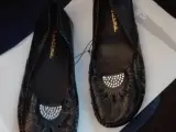 Små Karizma sorte sko