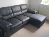 Ny moby sofa med chaiselong i sort læder fejlkøb 