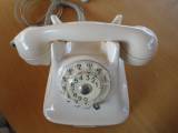 Flødefarvet drejeskive telefon