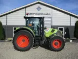 CLAAS Arion 620 C-matic med frontlift og frontPTO, affjedret foraksel og affjedret kabine. Opgraderet til Arion 650 - 4