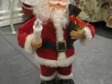 Syngende og dansende julemand. (til batteri)
