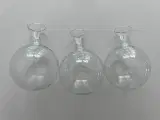 Tre glaskolber