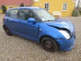 Suzuki Swift 1.3 i Årg 2007. Skadet front.   - 4