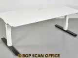 Hæve-/sænkebord med hvid plade