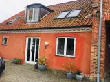 Dejligt byhus, der kun sælges sammen med Hovedgaden 34, 4261 Dalmose, der ligesom denne pt er en udlejet. - 2