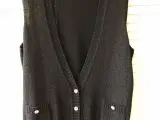 Vest med glimmertråde