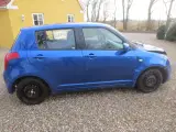 Suzuki Swift 1.3 i Årg 2007. Skadet front.   - 5