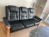 Tre-personers sofa