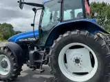 New Holland TM 125 KUN 3600 TIMER OG AFFJEDRET KABINE! - 5