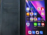 OnePlus 8 Pro Flot med ekstra ting.