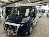 2009 - Dethleffs Globebus T001   Velholdt med dobbeltseng. - 2