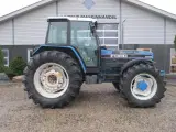 New Holland 7840 SLE, med rigtig god dæk montering og knap på vendergearet. - 2