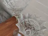 2 høje lanterner i glas til lys, eller blomster