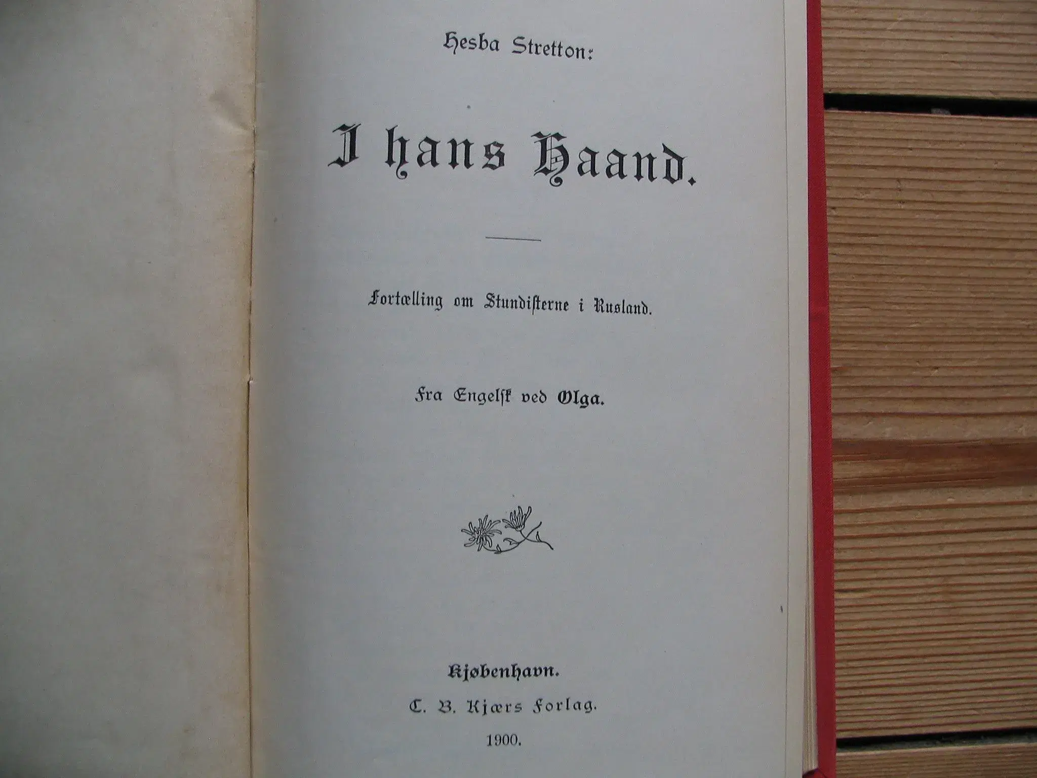 Hesba Stretton I hans haand fra 1900