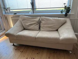 2 beige sofaer