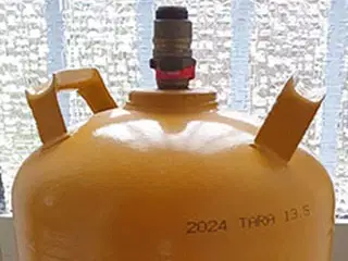 11 kg's gul ombytningsflaske (TOM)