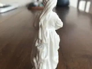 Lille hvid kvindefigur