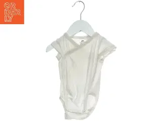 Hvid bodystocking til baby fra H&M (str. 62)