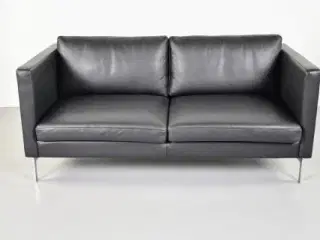 2-personers sofa i sort læder
