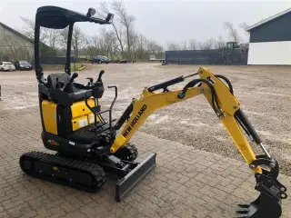 New Holland E12D new holland nye minigraver på vej hjem