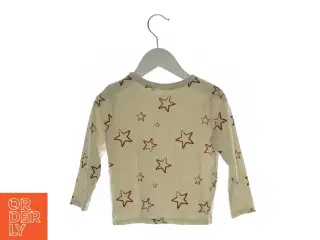 Bluse med stjerner på (str. ca. 104)