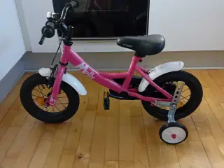 Sød pigecykel til salg.