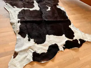 Ko skinds tæppe 
