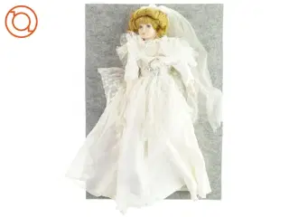 gammel porcelænsdukke (str. 50 x 15cm)