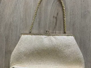 Vintage håndtaske i guld