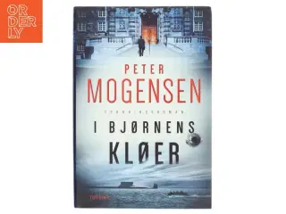 I bjørnens kløer : spændingsroman af Peter Mogensen (f. 1965-01-06) (Bog)