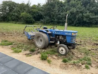 Iseki 1610 med fræser, og rotorklipper