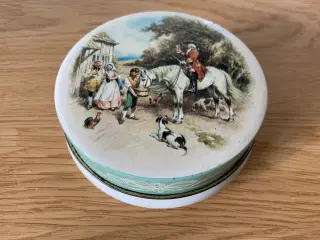 Rund gammel dåse med jagtmotiv