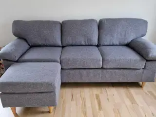 Sofa med skammel