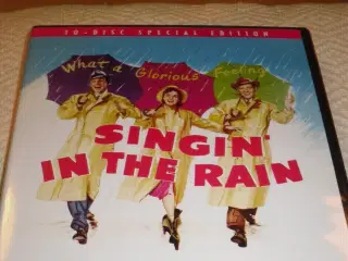 Singing IN THE RAIN.