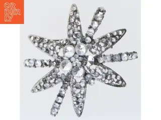 Sølvfarvet stjerneformet broche (str. 5,5 cm)