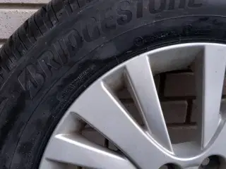 Helt nye Bridgestone vinterdæk på alufælge.